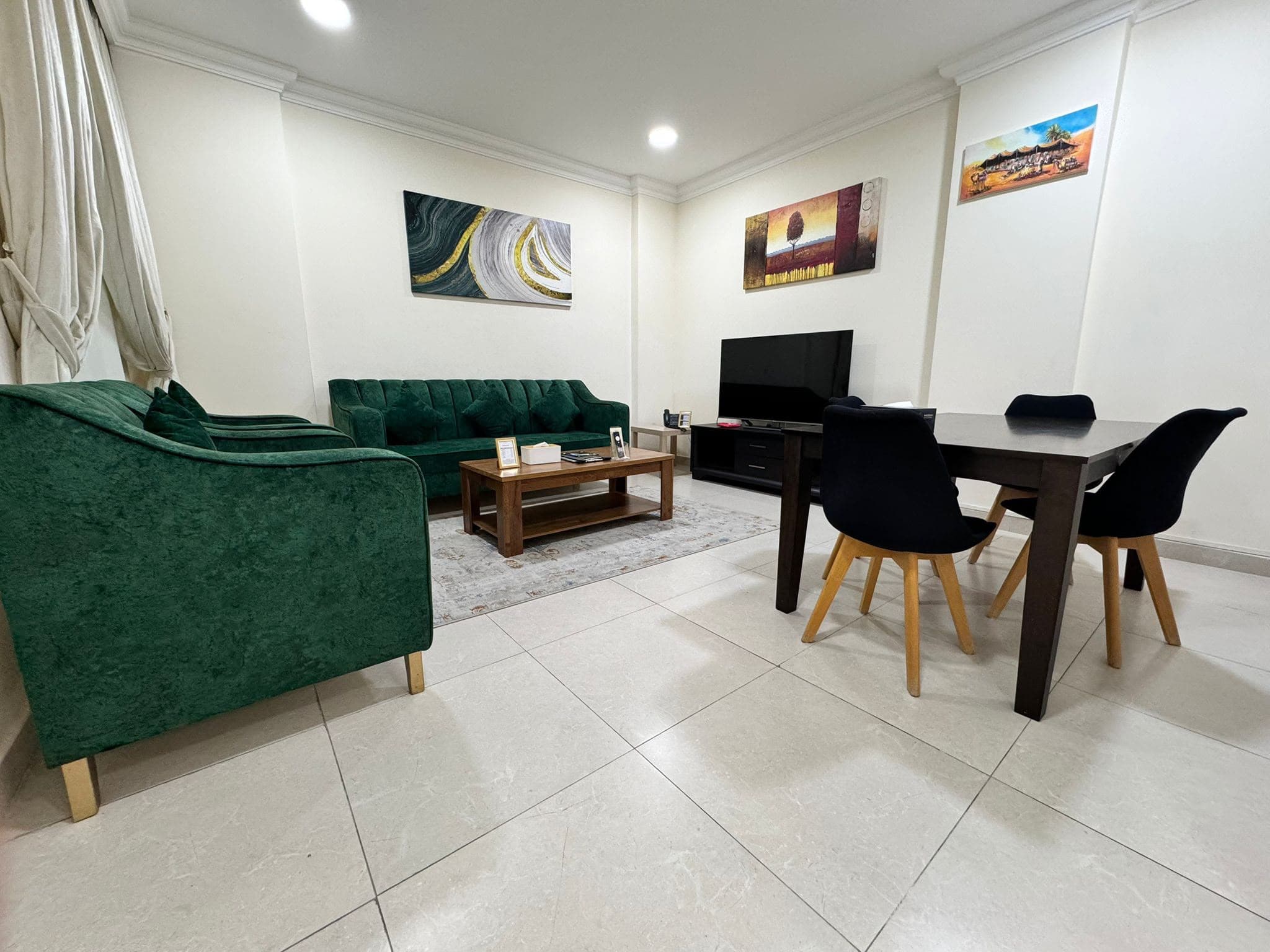 Living and dining room in a Chelsea Gardens two-bedroom apartment