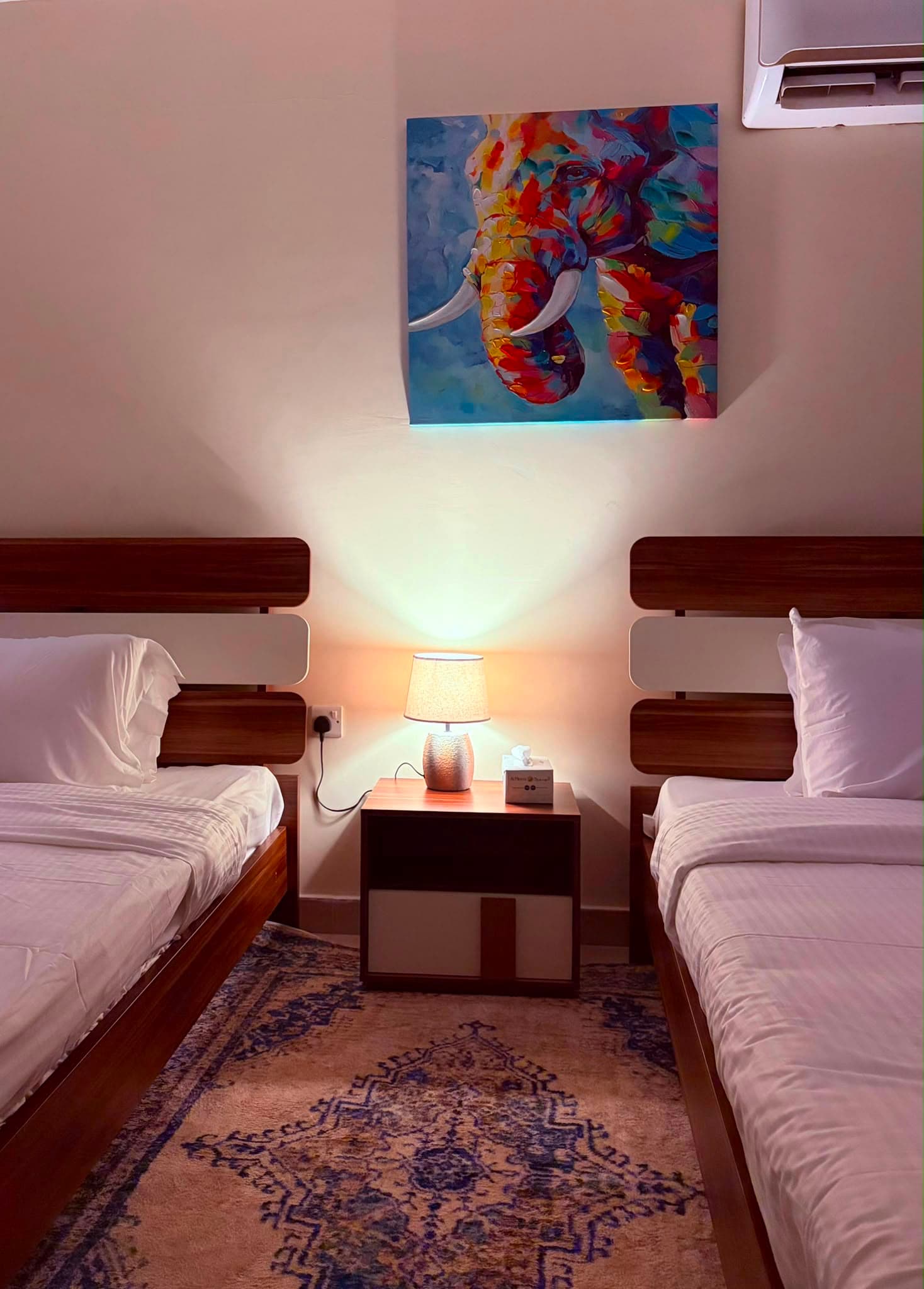 Twin bedroom with two single beds at Chelsea Gardens
